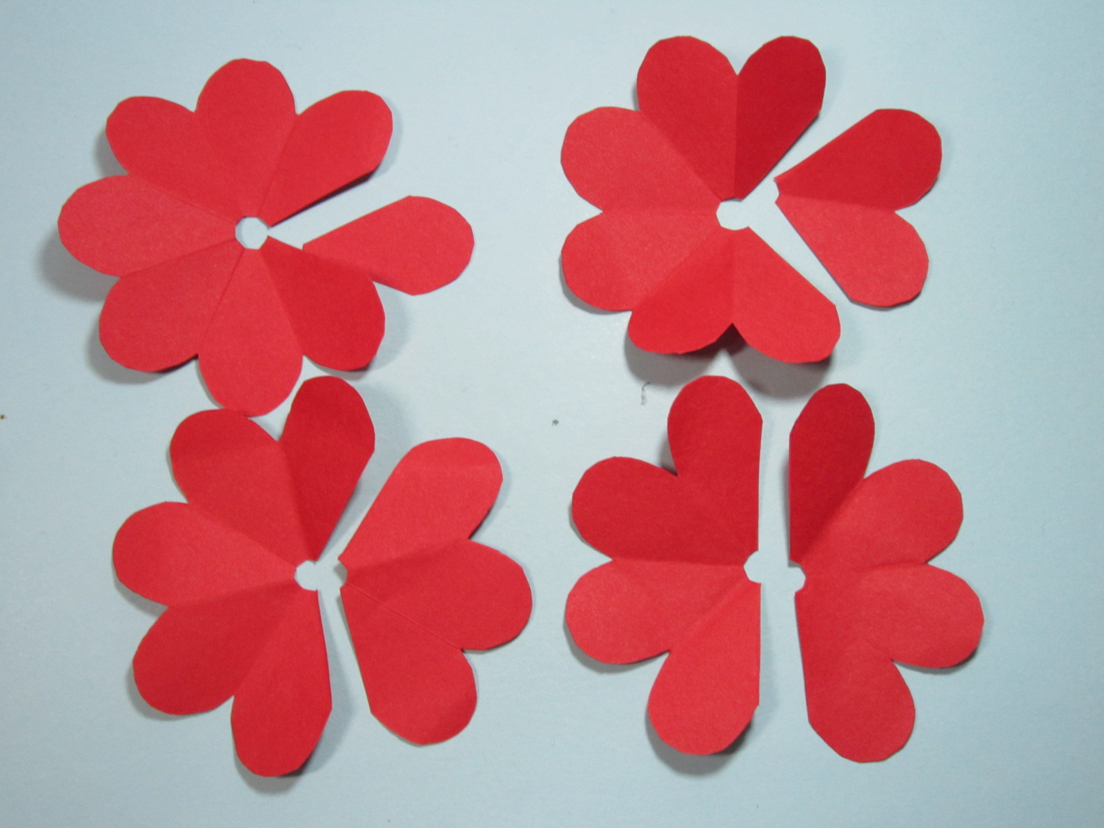 纸玫瑰花的折法(手工玫瑰花的折法步骤图解)