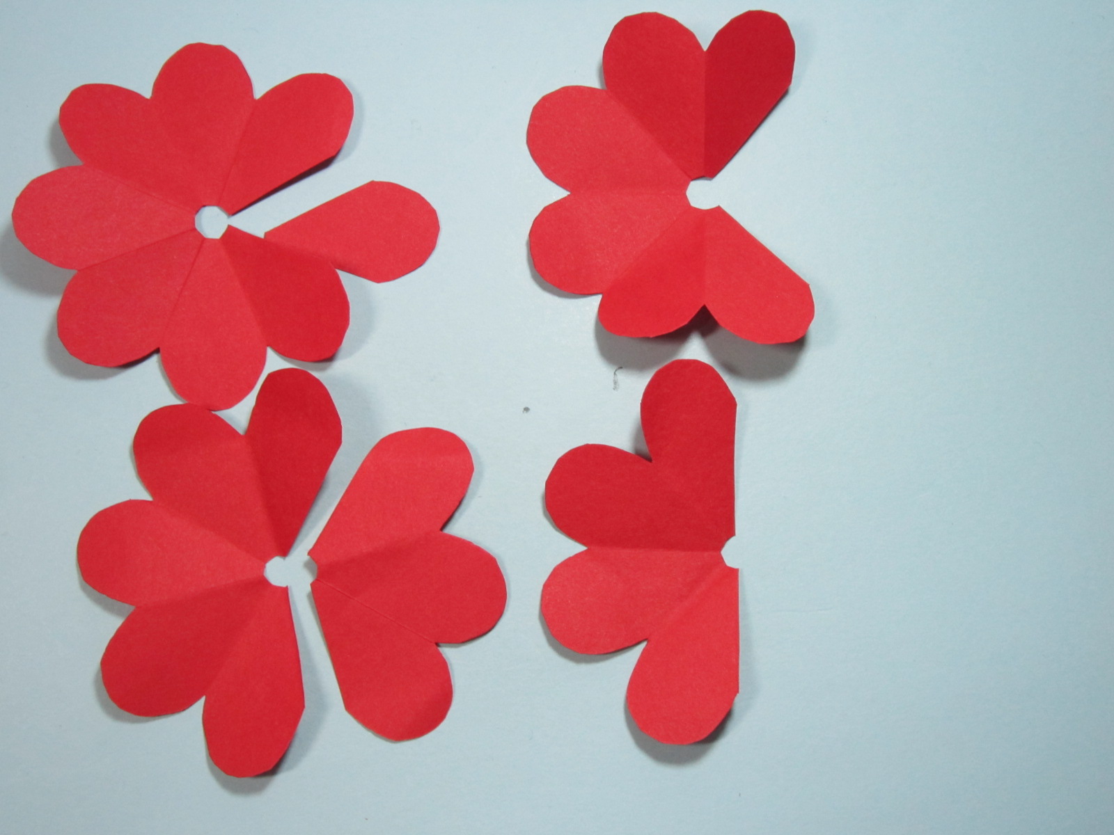 纸玫瑰花的折法(手工玫瑰花的折法步骤图解)